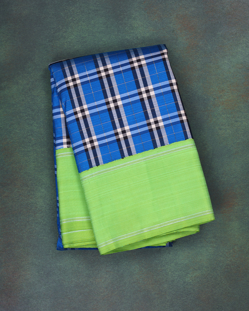 A full image of multi checks kanchipuram silk saree with korvai plain border.