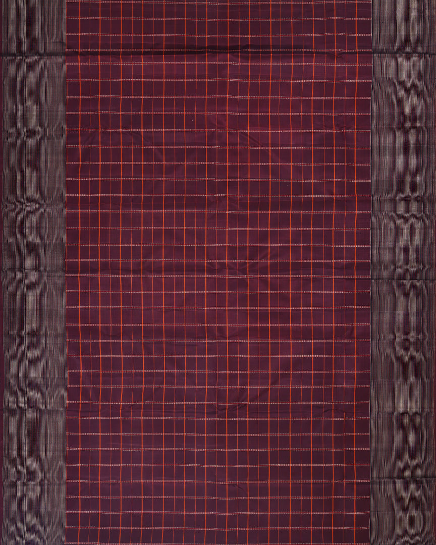 A full view of brown kanchipuram silk saree with traditional seet border and body checks