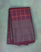  A handloom kanchipuram silk saree with thick checks on the body and traditional seer border
